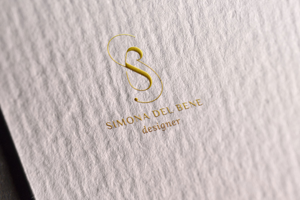 logo nobilitato embossing con stampa oro a caldo
